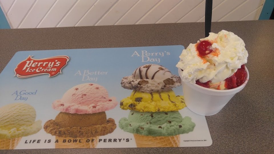 Printed menu showing comfort food and kid-friendly choices.