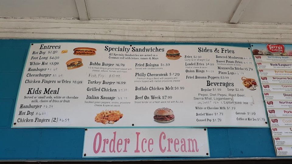 Quick-service menu with sandwiches, sides, and beverages.