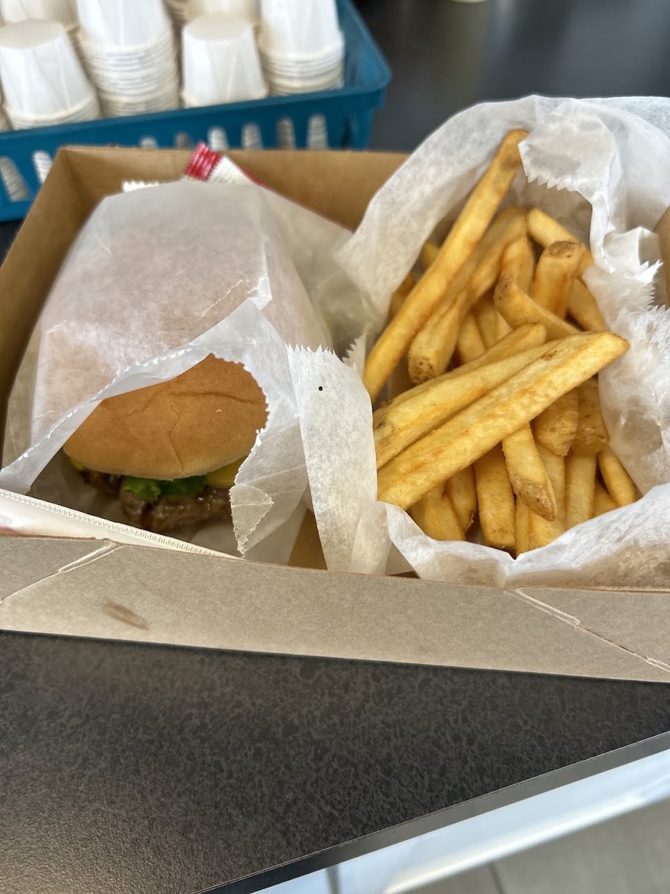 Quick-service menu with sandwiches, sides, and beverages.